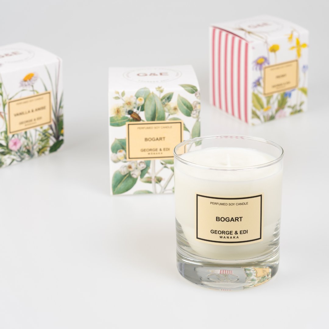 GROUP OF GEORGE & EDI PERFUMED SOY CANDLES IN FLORAL AND STRIPE BOXES